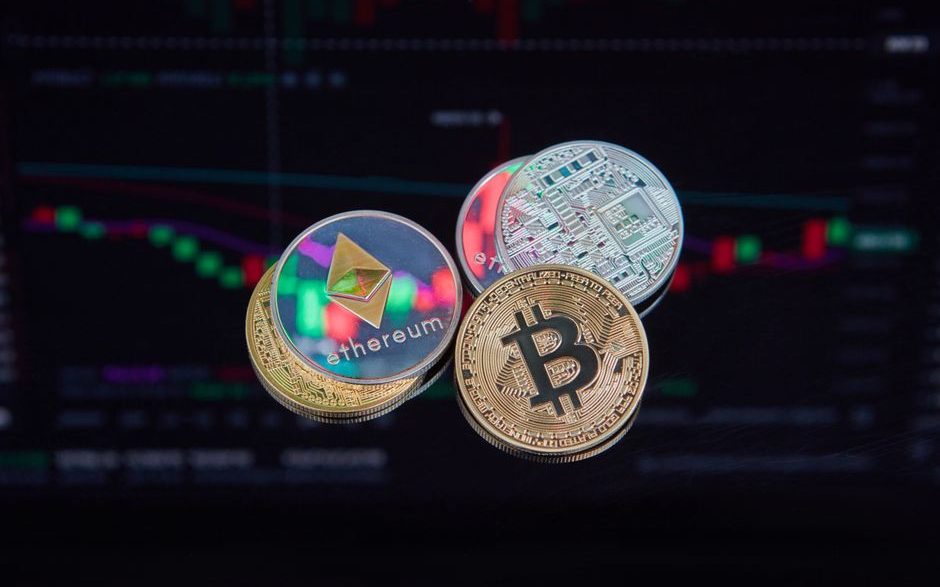Floating Bitcoin and Ethereum coins with a market trend chart in the background symbolizing digital finance.